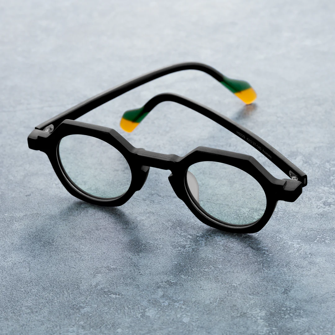Scene close-up view of Andrian geometric acetate eyeglasses GA0122209 in black