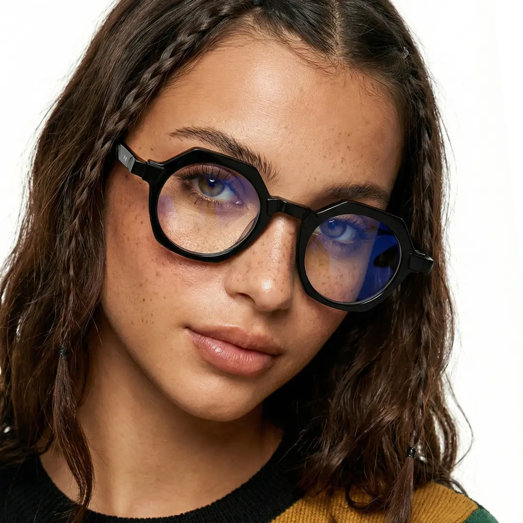 Face close-up view of female wearing vintage black geometric eyeglasses, neutral expression, GA0122209