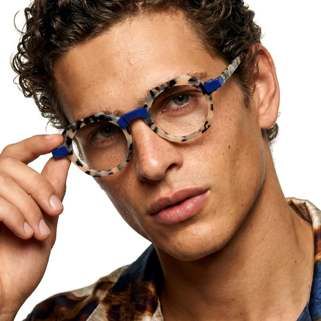 Front view of male wearing vintage tortoise geometric eyeglasses, touching frame, various expressions, GA0122209