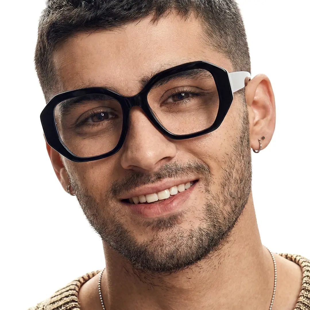 Front view of male wearing black gemetric eyeglasses, natural smile, GA0282509