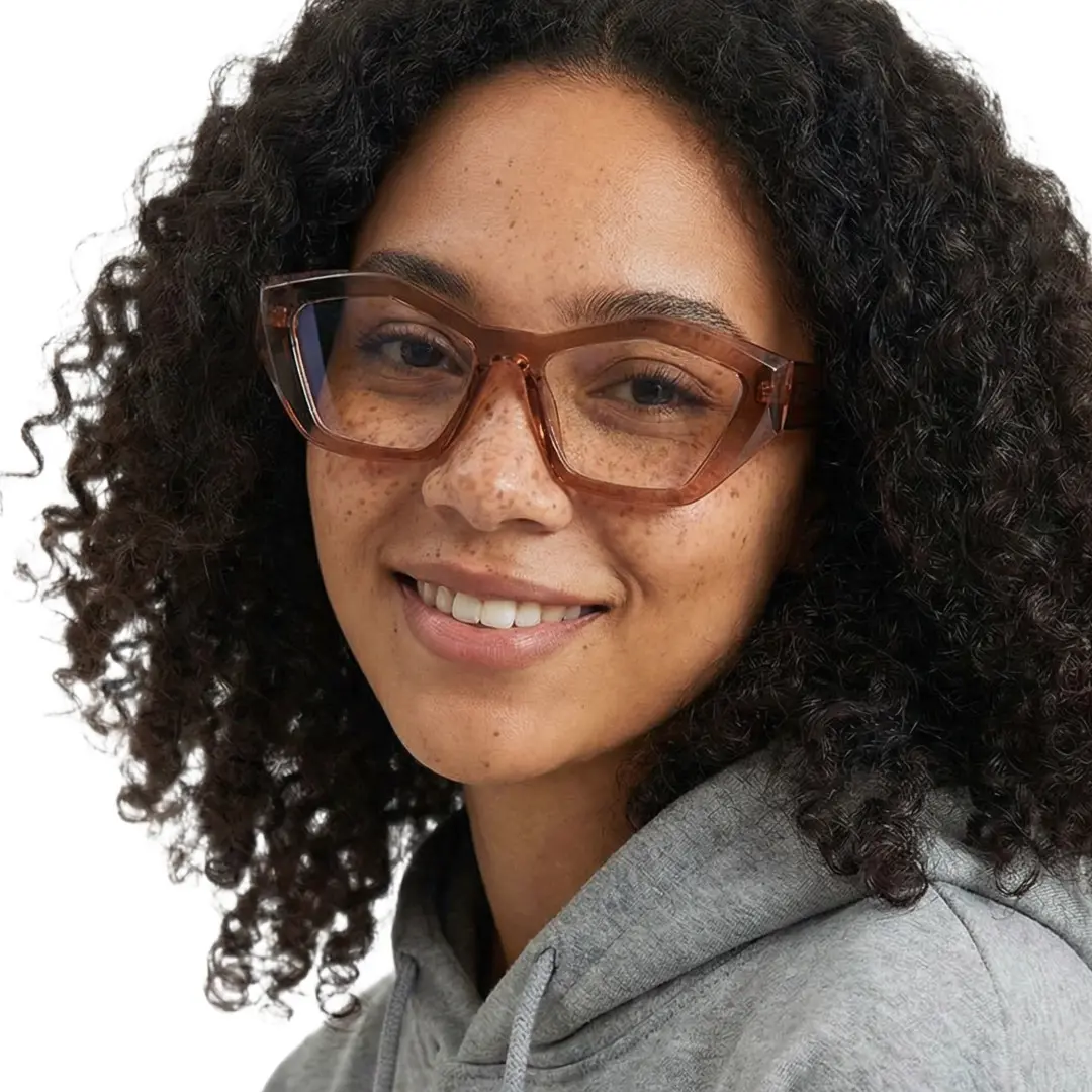 Front view of female wearing brown geometric eyeglasses, smiling, GA0302411