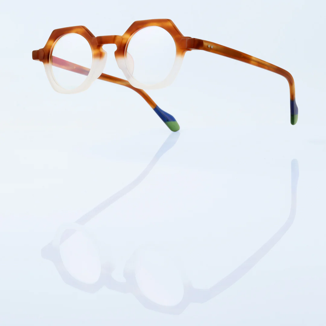 Scene close-up view of Byeo vintage geometric acetate eyeglasses in brown. SPU: GA0382302