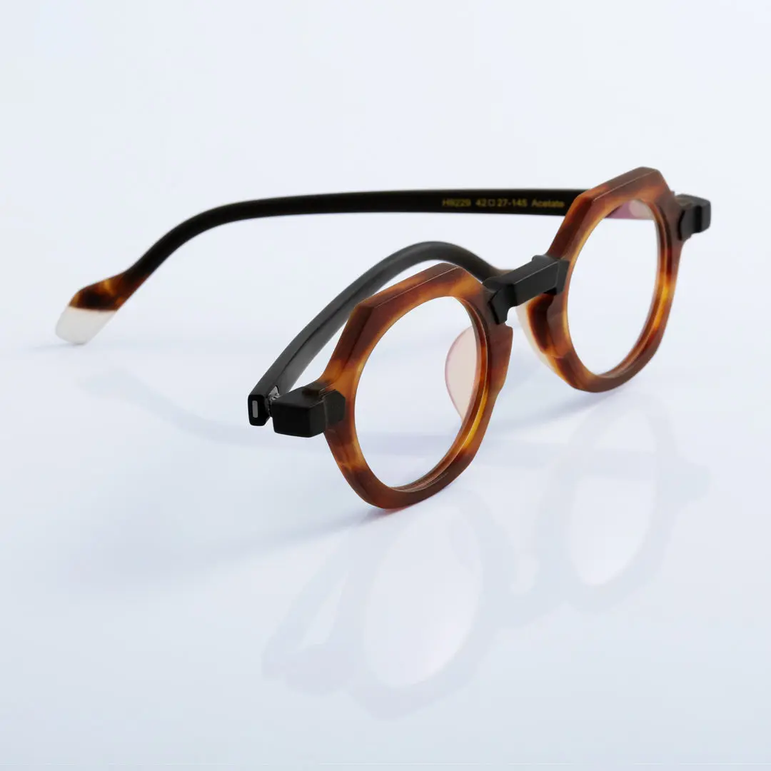 Scene close-up view of Byeo vintage geometric acetate eyeglasses in tortoise. SPU: GA0382302