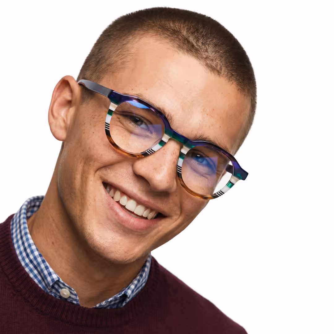 Male wearing colorful multicolor geometric acetate eyeglasses, smiling while looking at camera. SPU: GA0412605