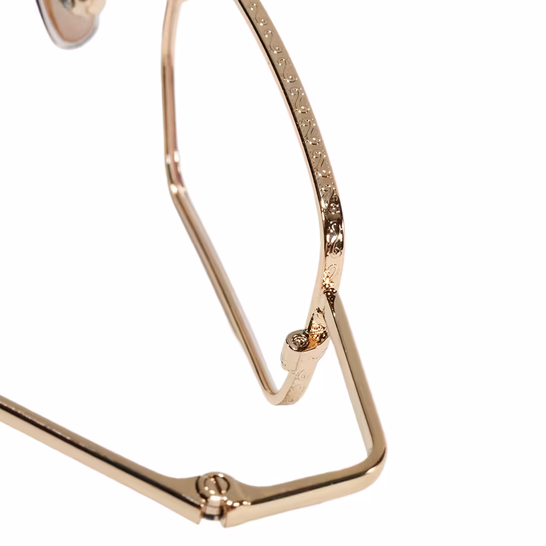 Hinge detail of Kyn vintage geometric metal eyeglasses GM0182605 in gold