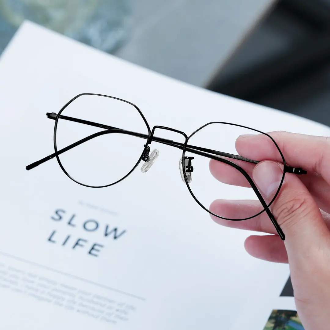 Scene close-up view of Hugo geometric metal eyeglasses GM0242409 in black