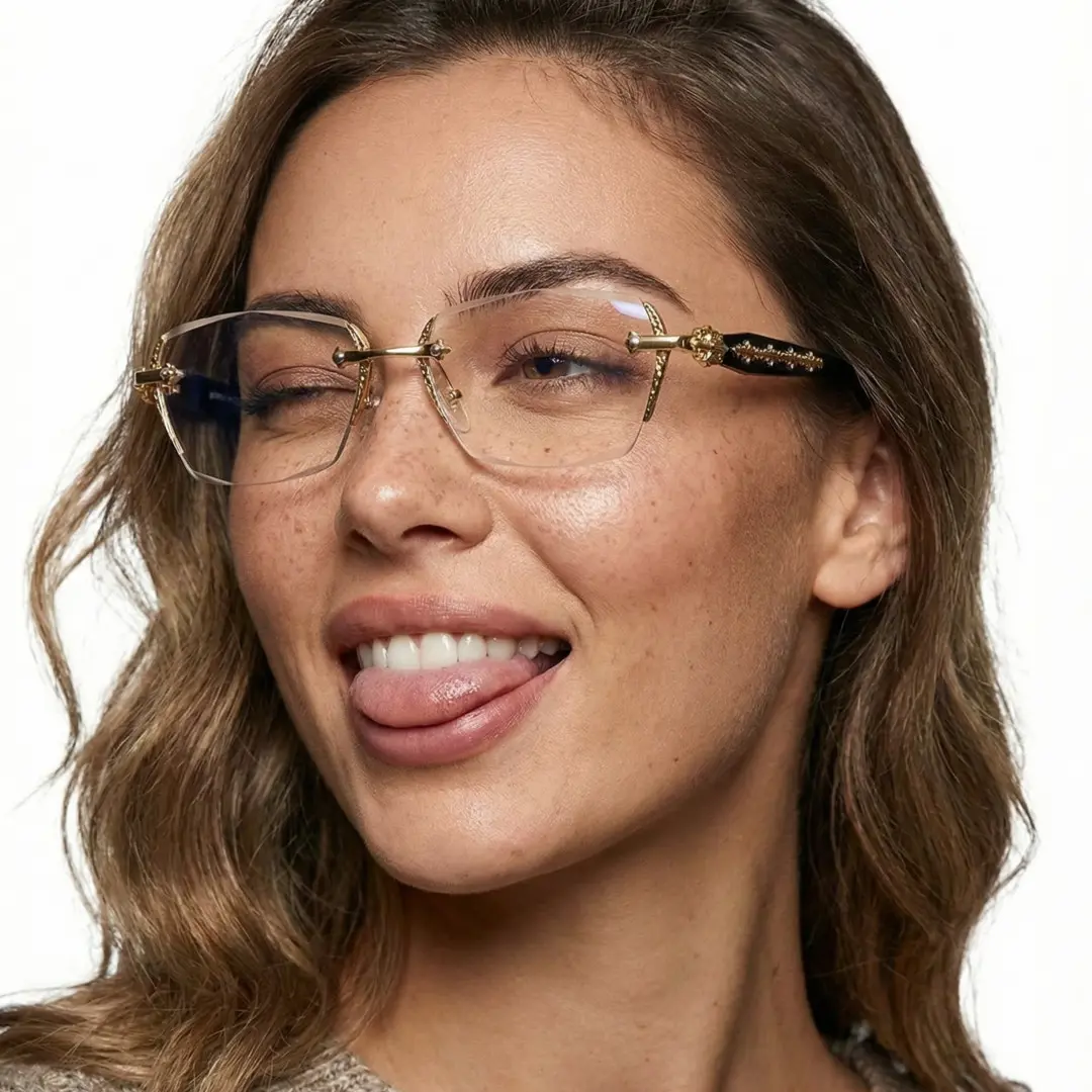 Three-quarter view of female wearing gold geometric eyeglasses, Sticking out tongue, smiling, GP0322512