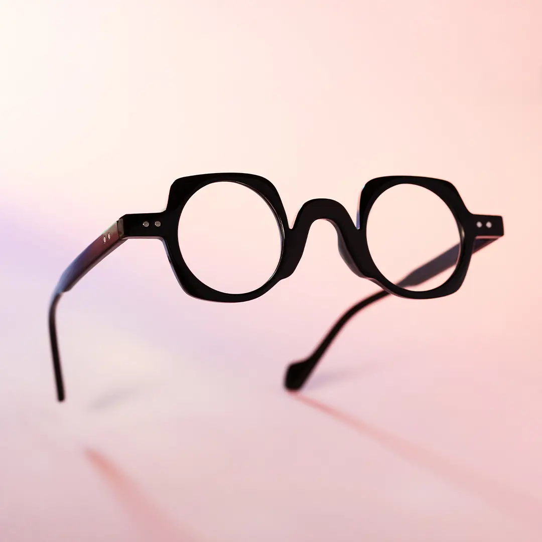 Scene close-up view of Rust vintage geometric pc eyeglasses GP0342411 in black