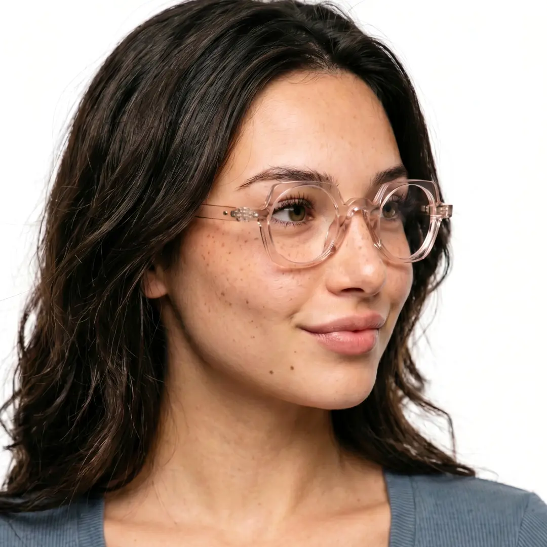 Three-quarter view of female wearing vintage light pink geometric eyeglasses, natural smile, GP0342411