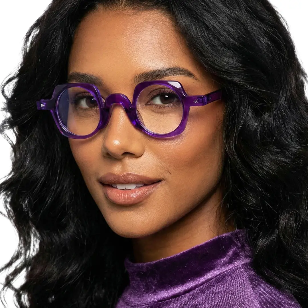 Close-up view of female wearing purple geometric eyeglasses, natural expression, GP0342411
