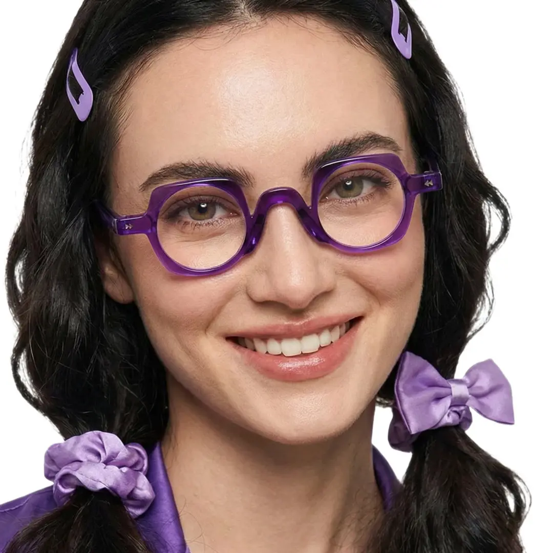 Face close-up view of female wearing purple geometric eyeglasses, friendly smile, GP0342411