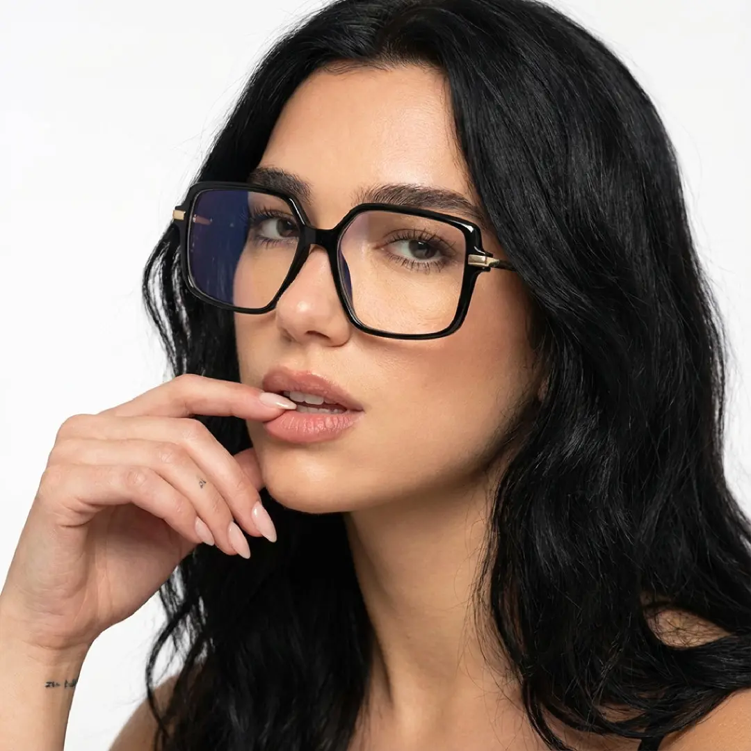 Profile view of female wearing black geometric eyeglasses, neutral expression, GR0032510