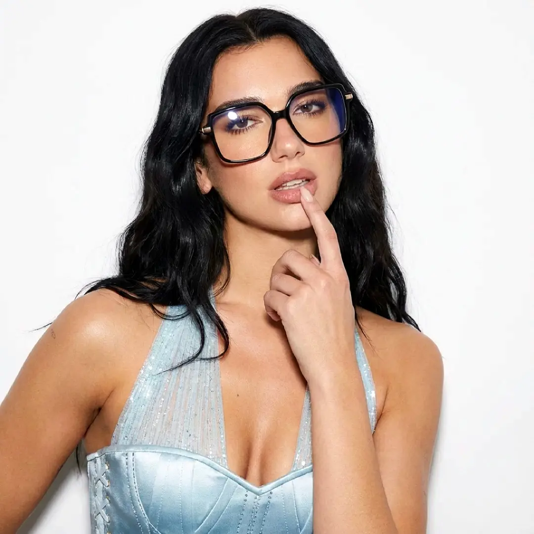 Three-quarter view of female wearing black geometric eyeglasses, neutral expression, GR0032510