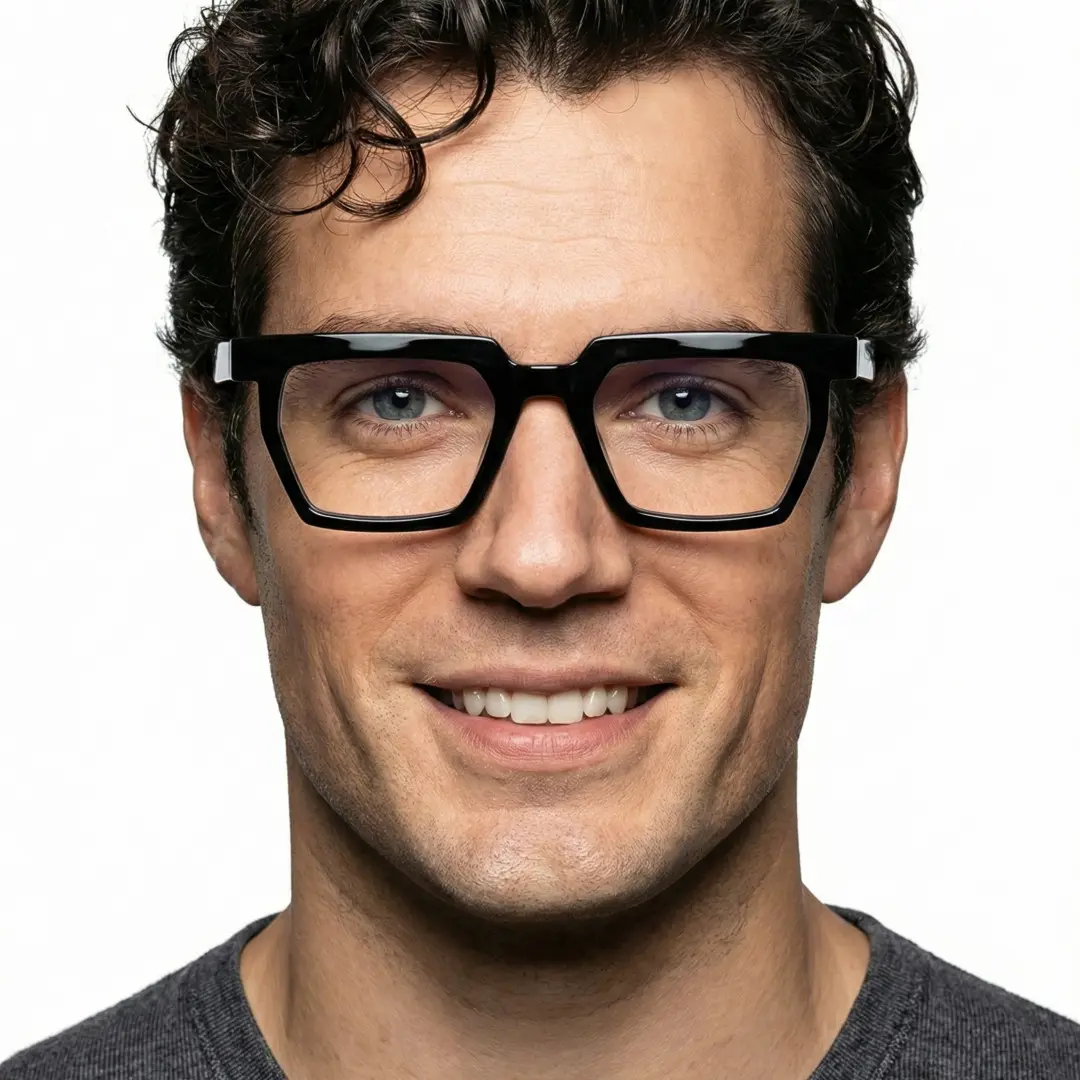 Front view of male wearing black geometric eyeglasses, natural smile, GR0432302