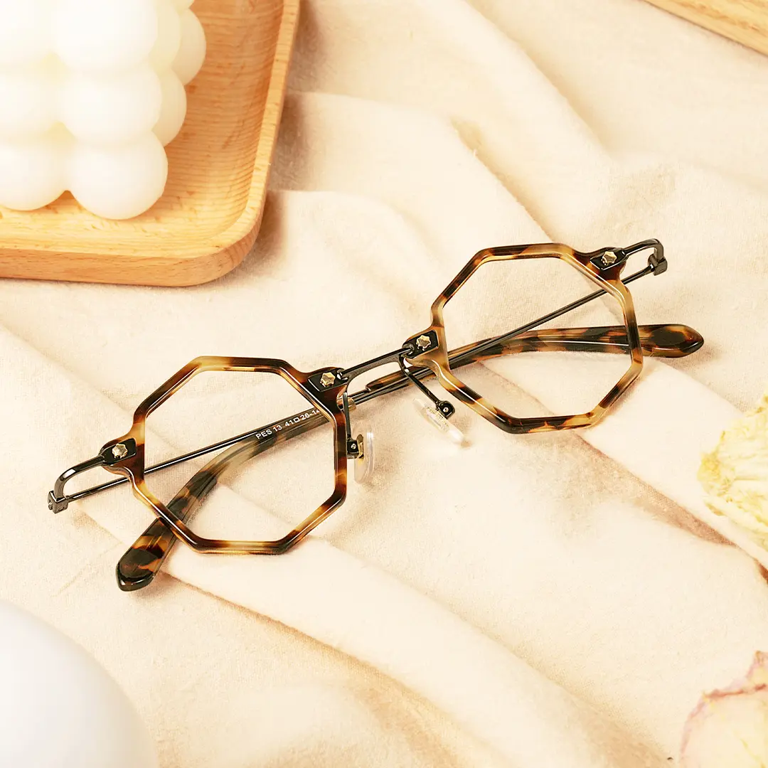 Scene close-up view of Union steampunk geometric titanium eyeglasses GT0332411 in tortoise
