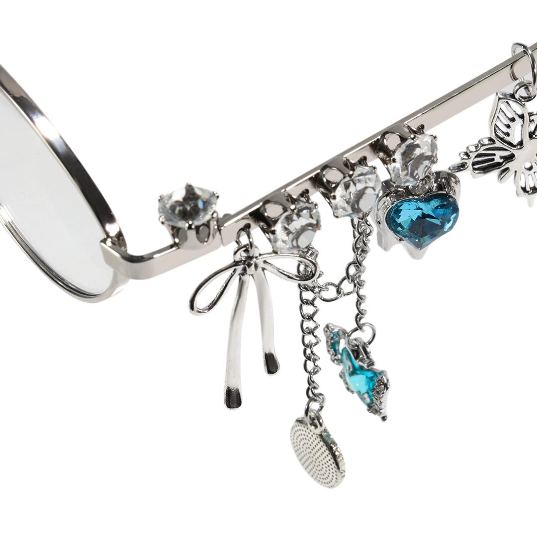 Frame detail view of Eulalia y2k oval metal eyeglasses OM0062511 in blue
