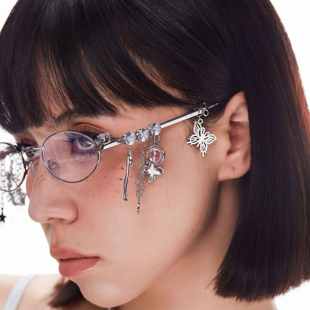 Face close-up view of female wearing y2k purple oval eyeglasses, neutral expression, OM0062511