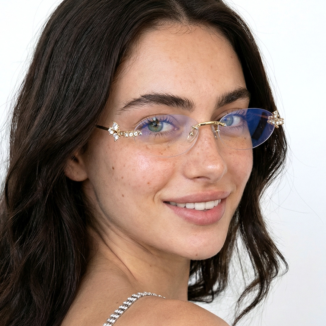 Over-the-shoulder view of female wearing fashion gold oval eyeglasses, smiling, OM0172601