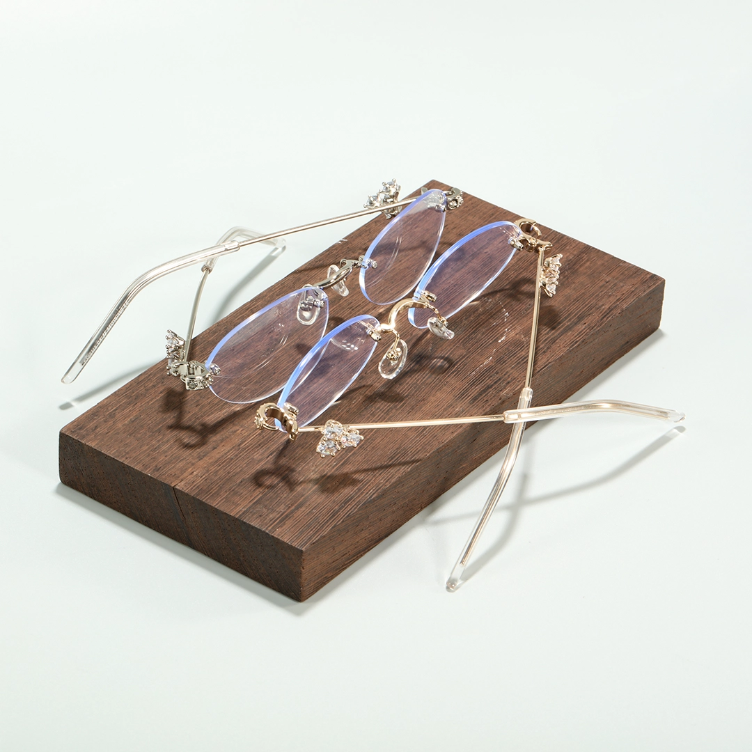 Scene view of Ivana fashion oval metal eyeglasses OM0172601 in gold