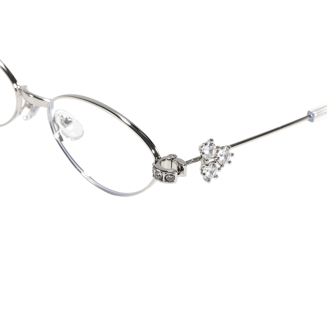 End piece detail of Arla y2k oval tr90 eyeglasses OM0252601 in silver