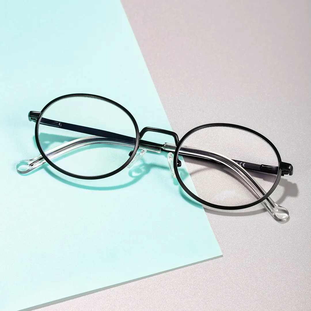 Scene view of Bongrt vintage oval metal eyeglasses OM0302410 in black
