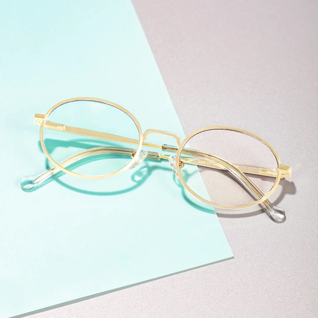 Scene view of Bongrt vintage oval metal eyeglasses OM0302410 in gold