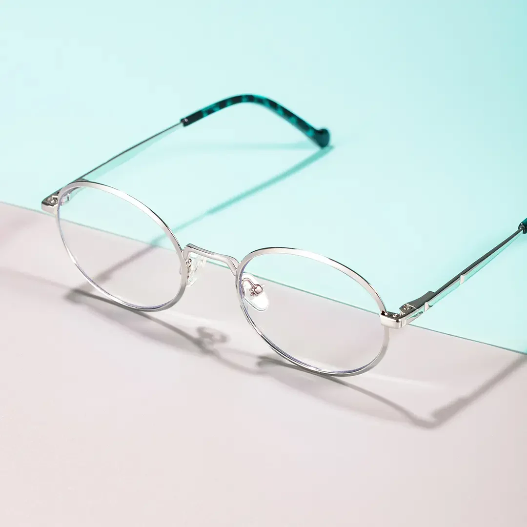 Scene view of Bongrt oval metal eyeglasses OM0302410 in silver