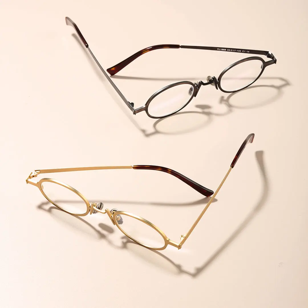 Scene close-up view of Tonny vintage oval metal eyeglasses OM0592302 in black