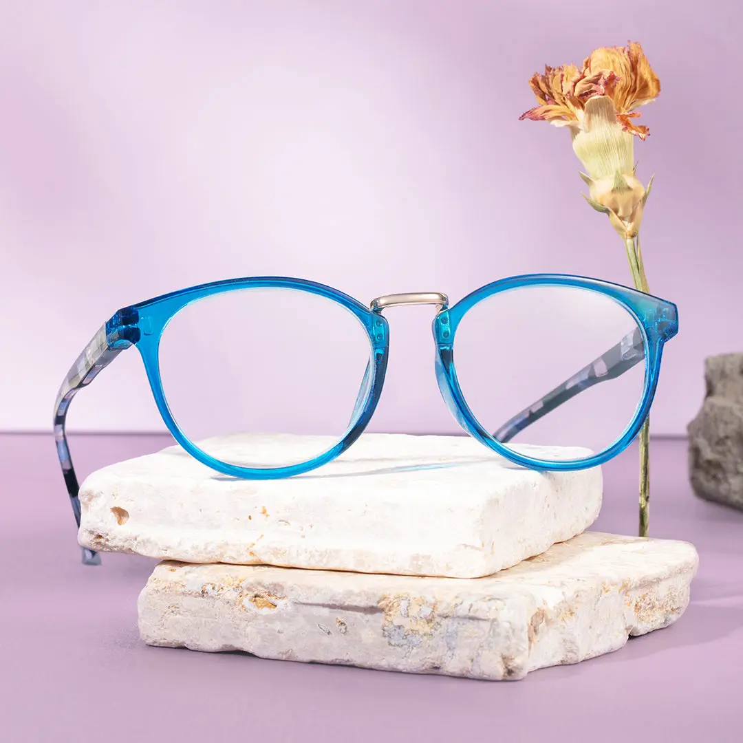 Scene close-up view of Brianna colorful oval pc eyeglasses in blue. SPU: OP0222311