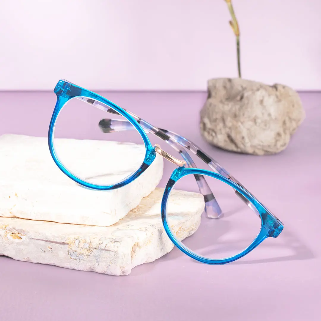 Scene view of Brianna colorful oval pc eyeglasses in blue. SPU: OP0222311