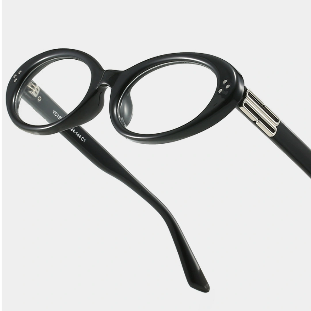Frame detail view of Basia y2k oval tr90 eyeglasses in black. SPU: OR0022506