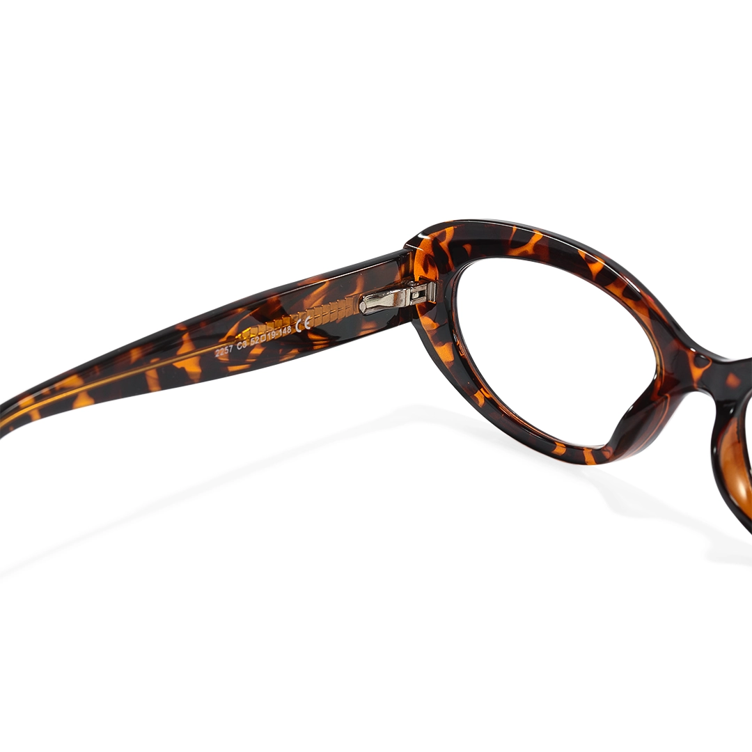 Hinge detail of Ellie y2k oval tr90 eyeglasses in tortoise. SPU: OR0132510