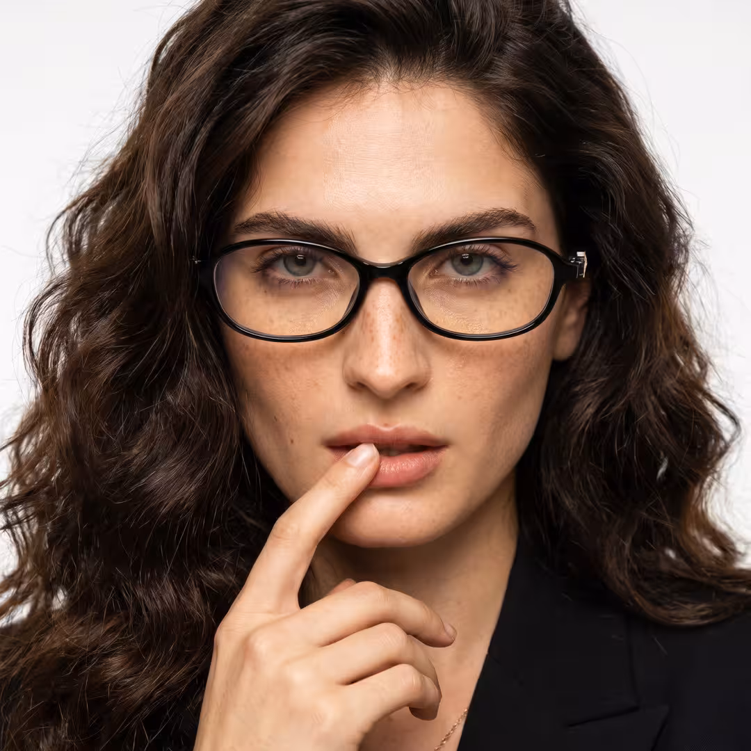 Female wearing y2k black oval tr90 eyeglasses, natural expression. SPU: OR0212411