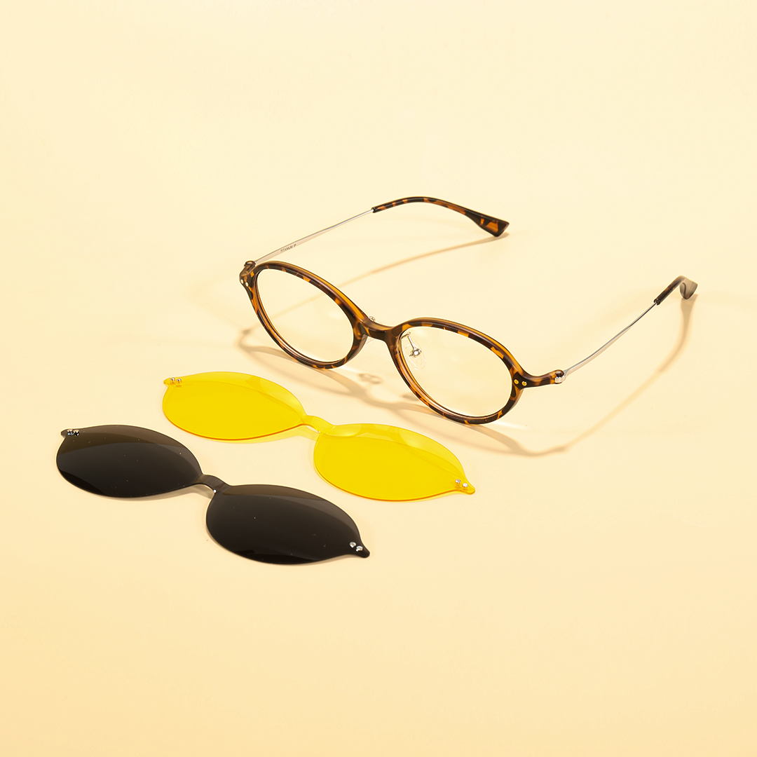 Scene view of Perrin oval tr90 magnetic clip-on eyeglasses set with interchangeable toppers OR0372601 in tortoise