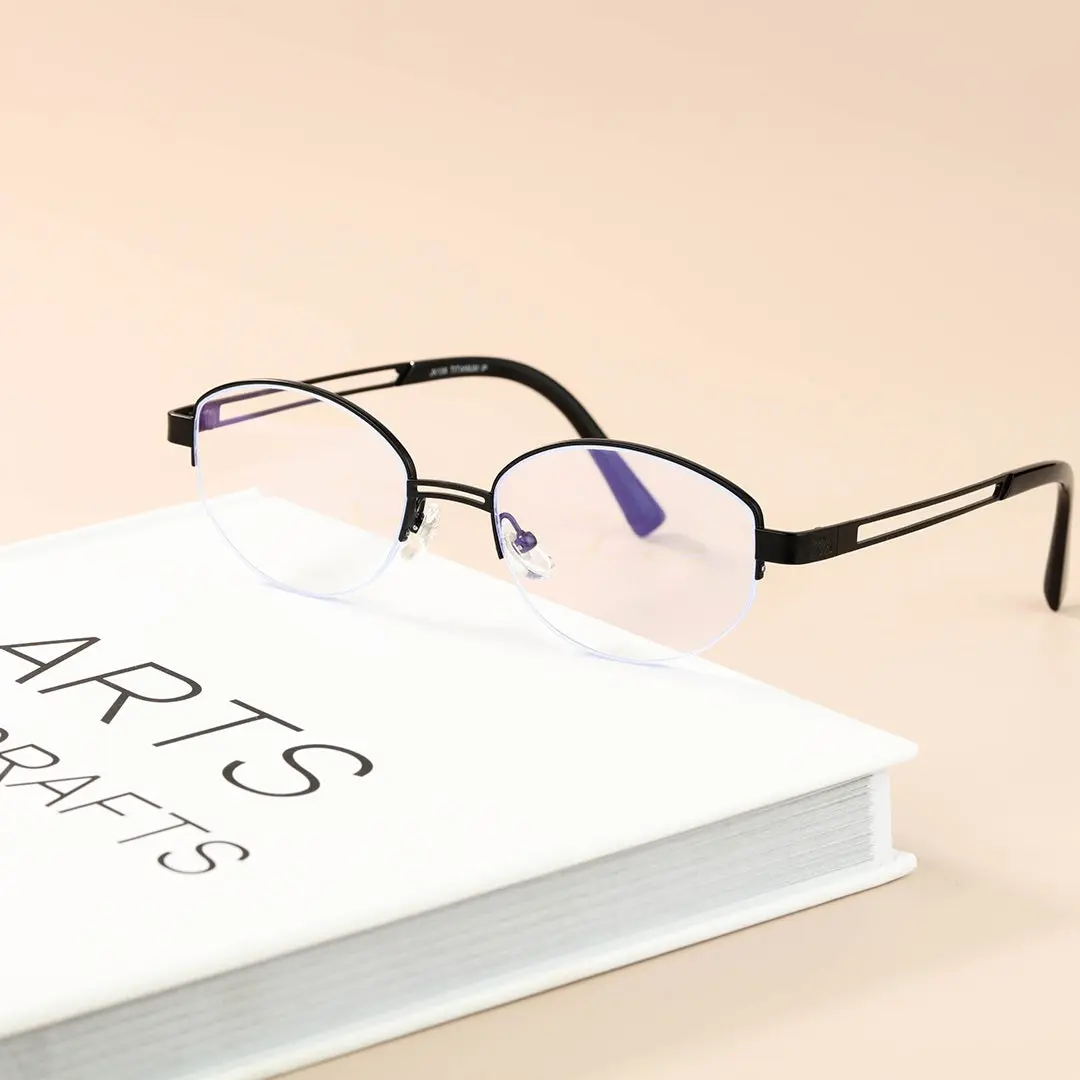 Scene view of Vivacity y2k oval titanium eyeglasses OT0022501 in black