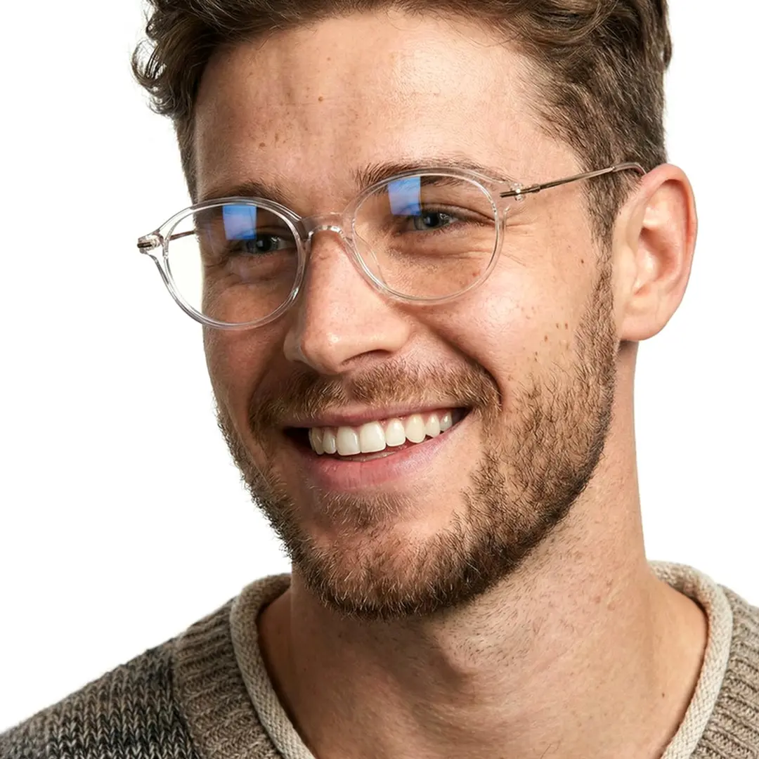Looking away view of male wearing y2k clear oval eyeglasses, smiling, OT0102412