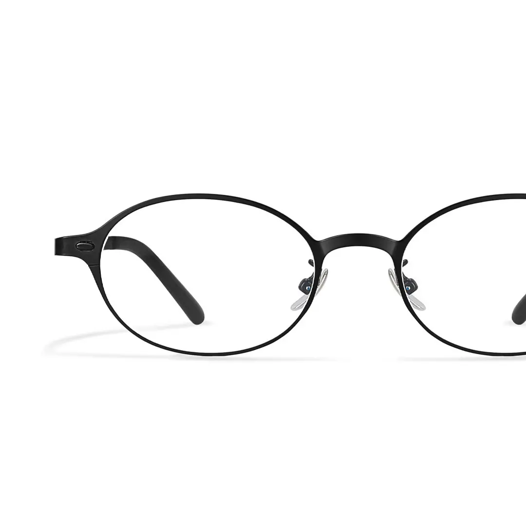 Frame detail view of Tompkin y2k oval titanium eyeglasses OT0132412 in black