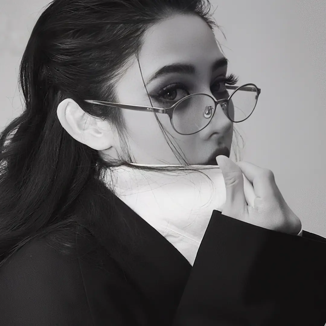 Profile view of female wearing y2k black oval eyeglasses, neutral expression, OT0132412