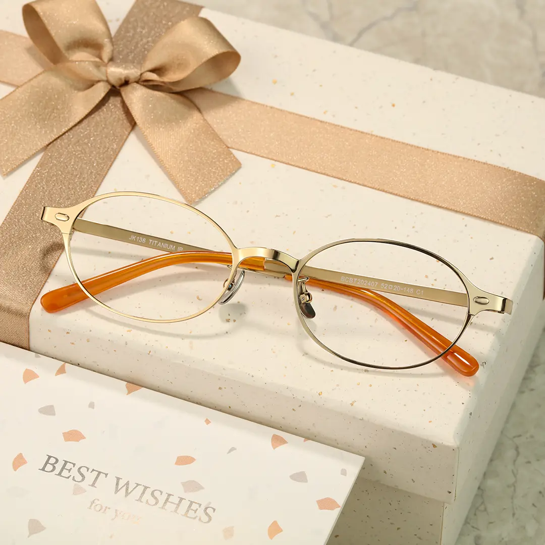 Scene view of Tompkin y2k oval titanium eyeglasses OT0132412 in gold