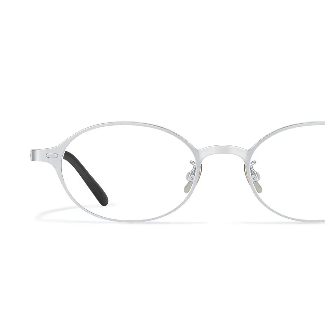 Frame detail view of Tompkin y2k oval titanium eyeglasses OT0132412 in silver