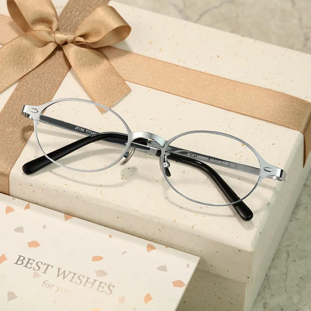 Scene view of Tompkin y2k oval titanium eyeglasses OT0132412 in silver