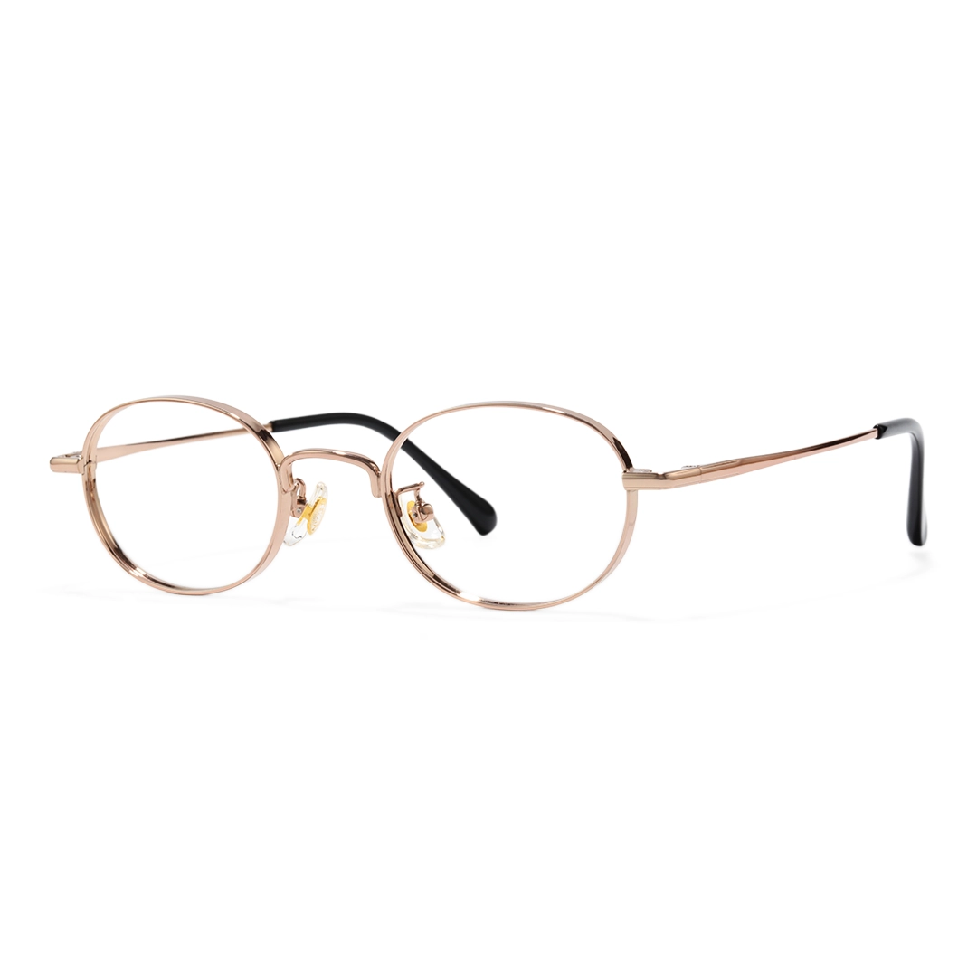 Angle view of Astr y2k oval titanium eyeglasses OT0282502 in gold