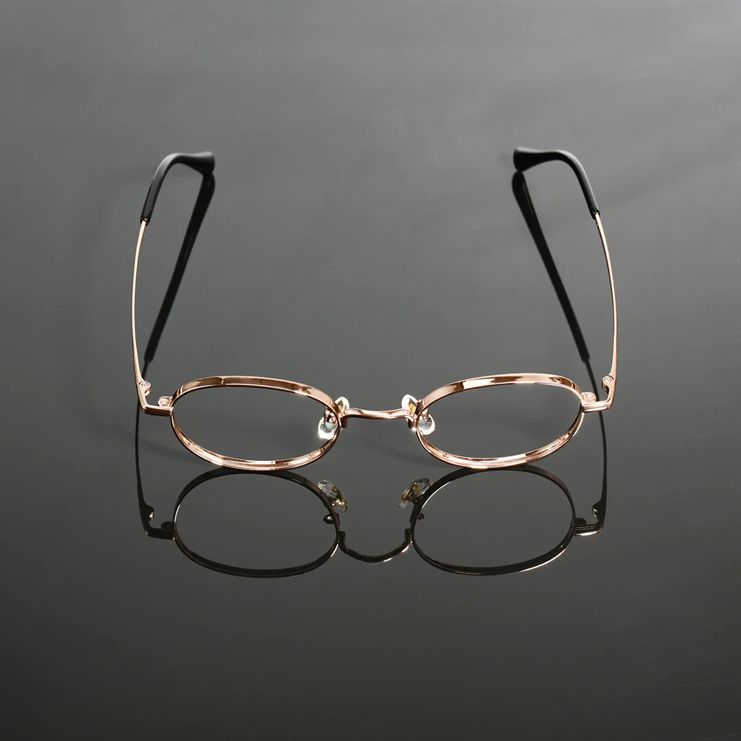 Scene view of Astr y2k oval titanium eyeglasses OT0282502 in gold