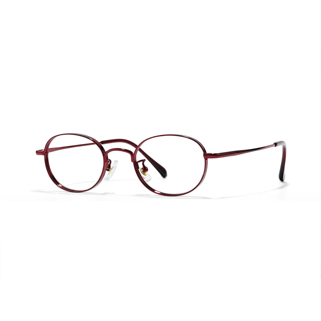 Angle view of Astr oval titanium eyeglasses OT0282502 in red