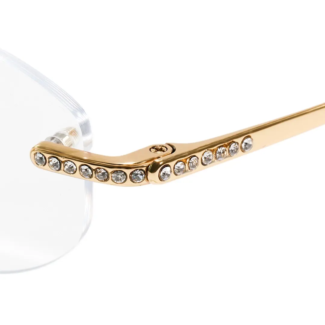 End piece diamond detail of Mirelle fashion oval titanium eyeglasses in gold. SPU: OT0312604