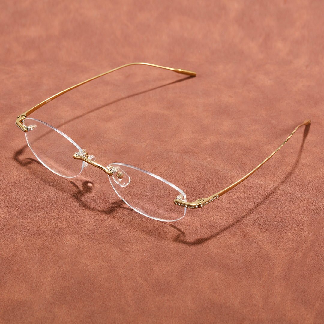 Scene view of Mirelle fashion oval titanium eyeglasses in gold. SPU: OT0312604