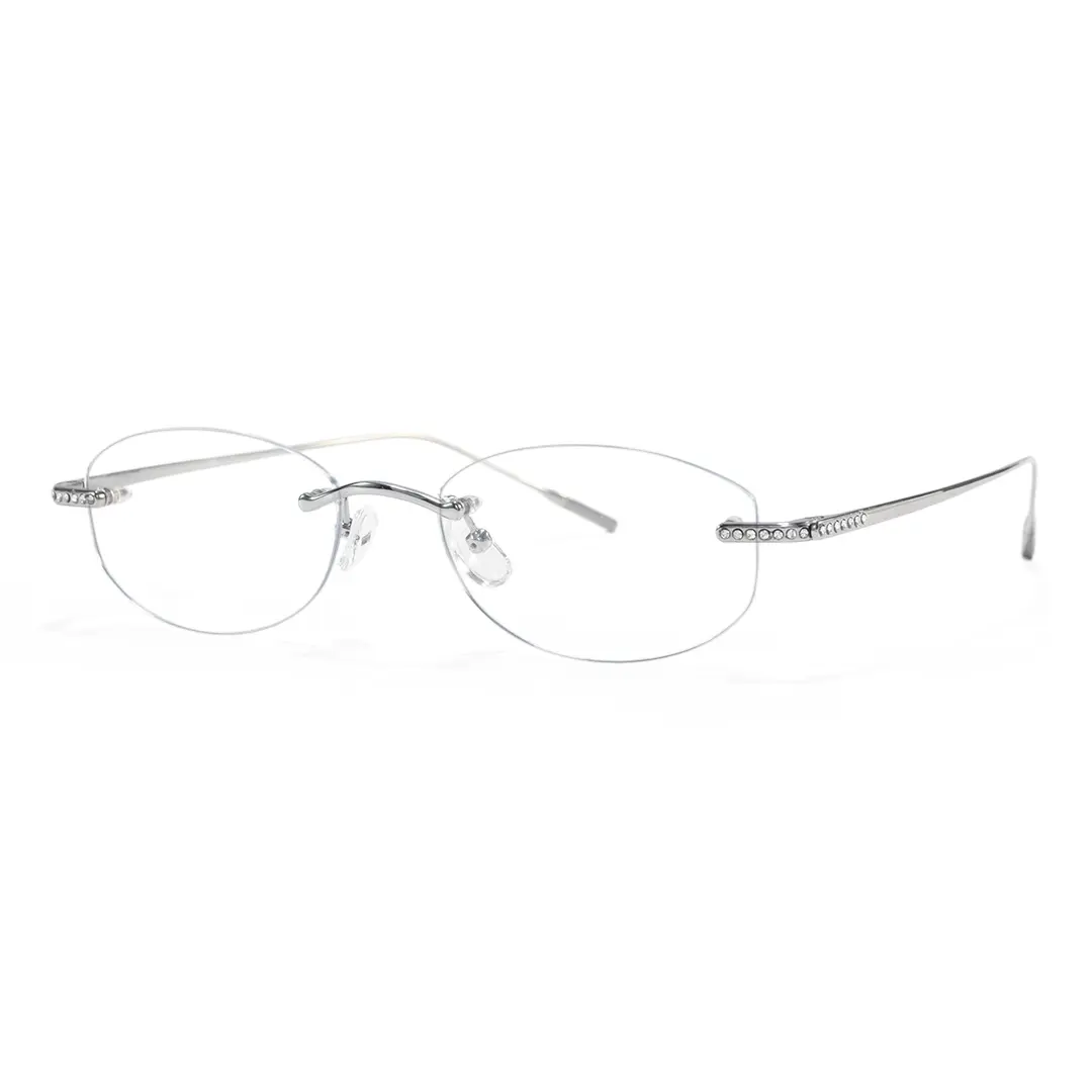 Angle view of Mirelle fashion oval titanium eyeglasses OT0312604 in silver