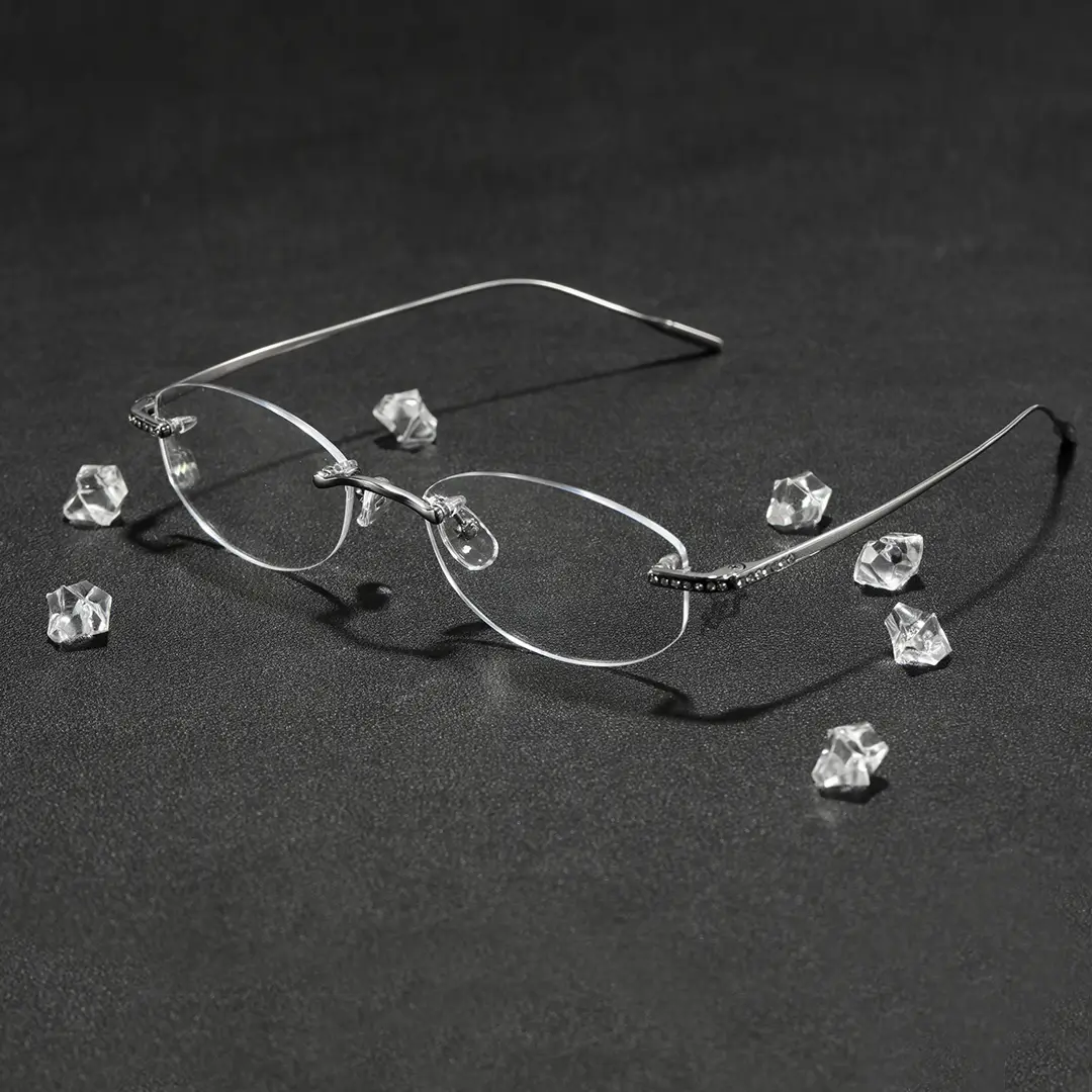 Scene view of Mirelle fashion oval titanium eyeglasses in silver. SPU: OT0312604