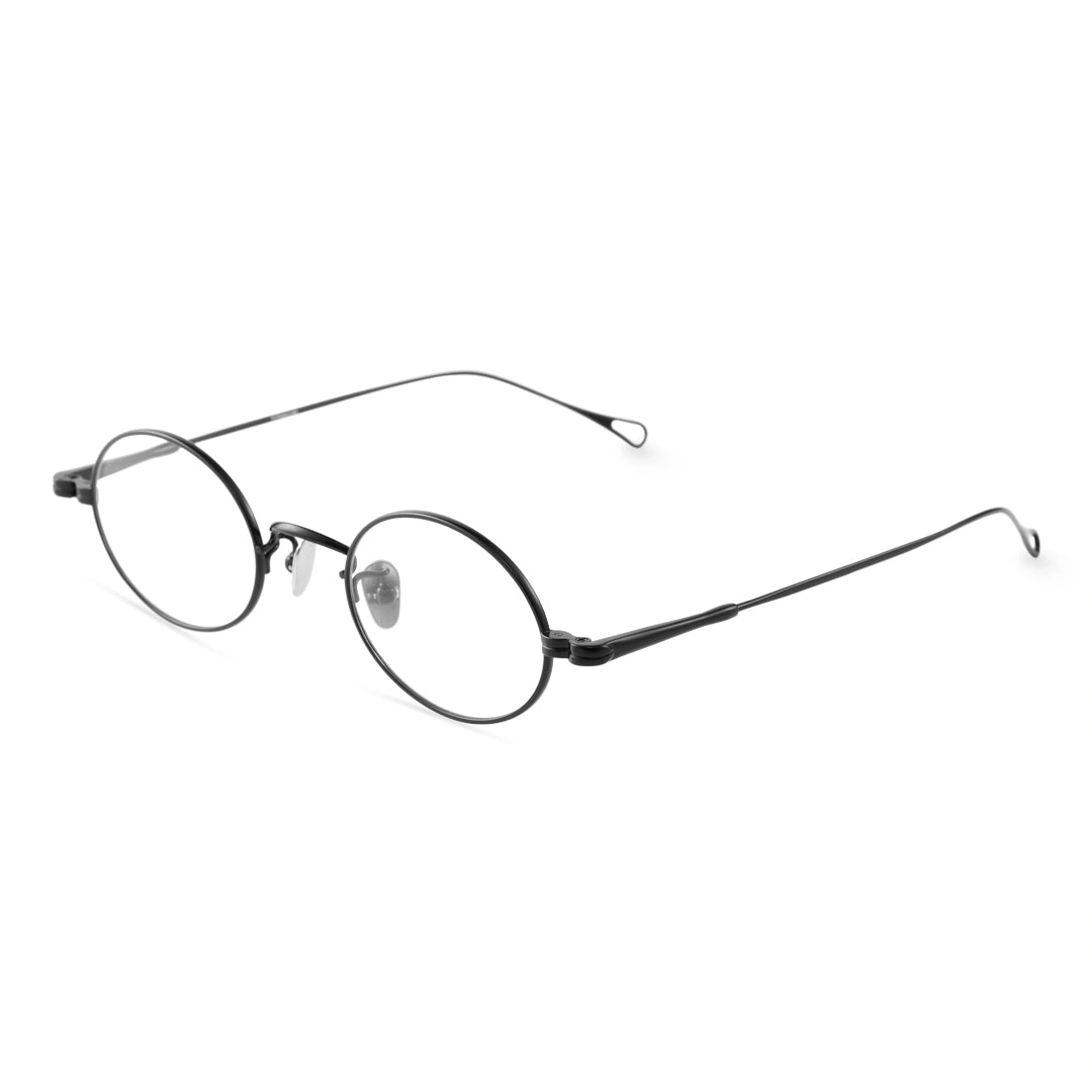 Angle view of Gannon y2k oval titanium eyeglasses OT0402412 in black