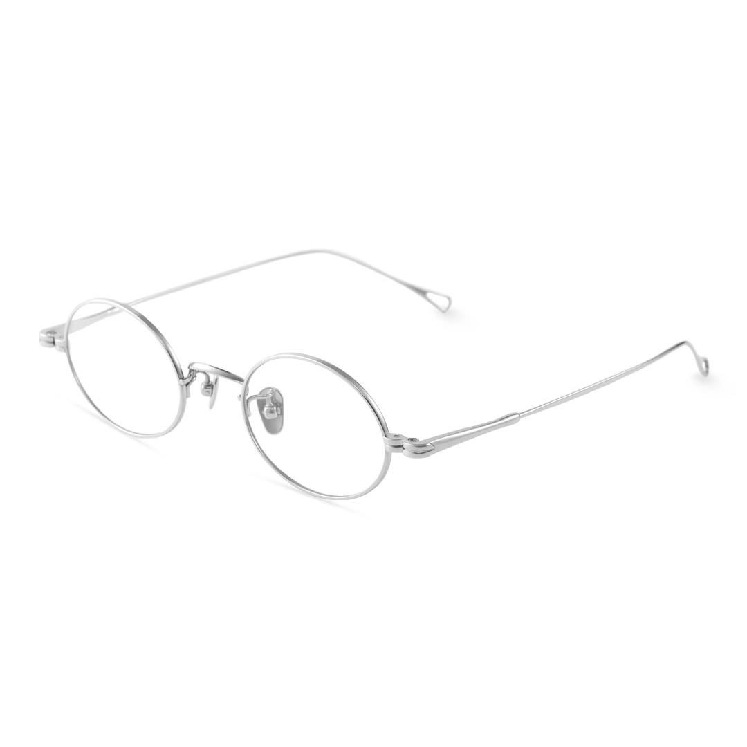 Angle view of Gannon y2k oval titanium eyeglasses OT0402412 in silver